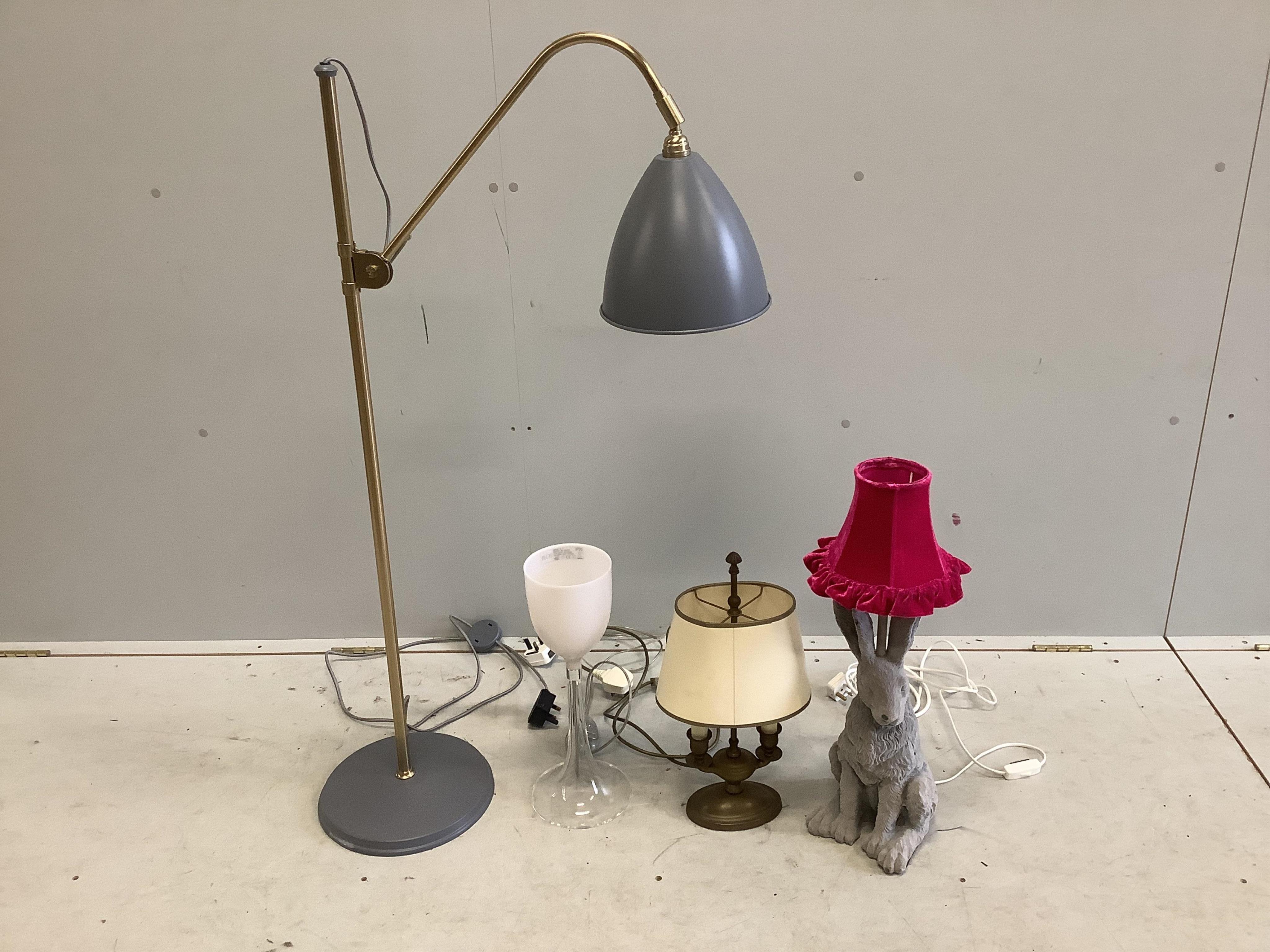 A Contemporary adjustable floor lamp, a table lamp modelled as a hare and two others. Condition - fair to good